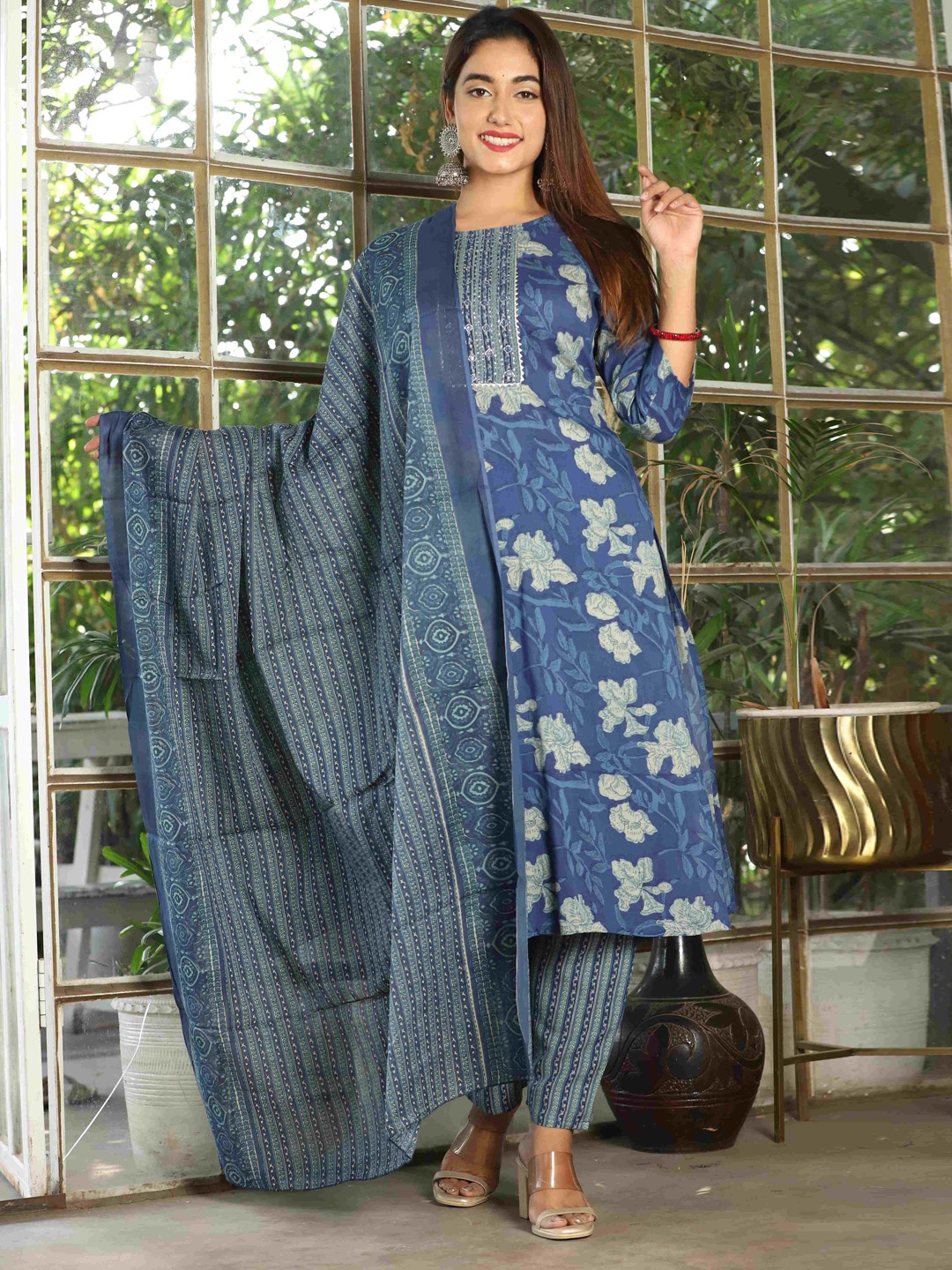 

DARVIKAA COLLECTION Floral Printed Thread Work Kurta With Trousers & Dupatta, Blue