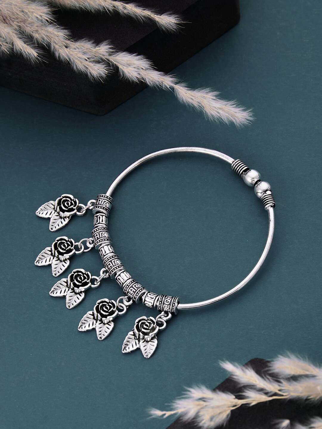 

ATIBELLE German Silver Plated & Floral Shaped Adjustable Bangle