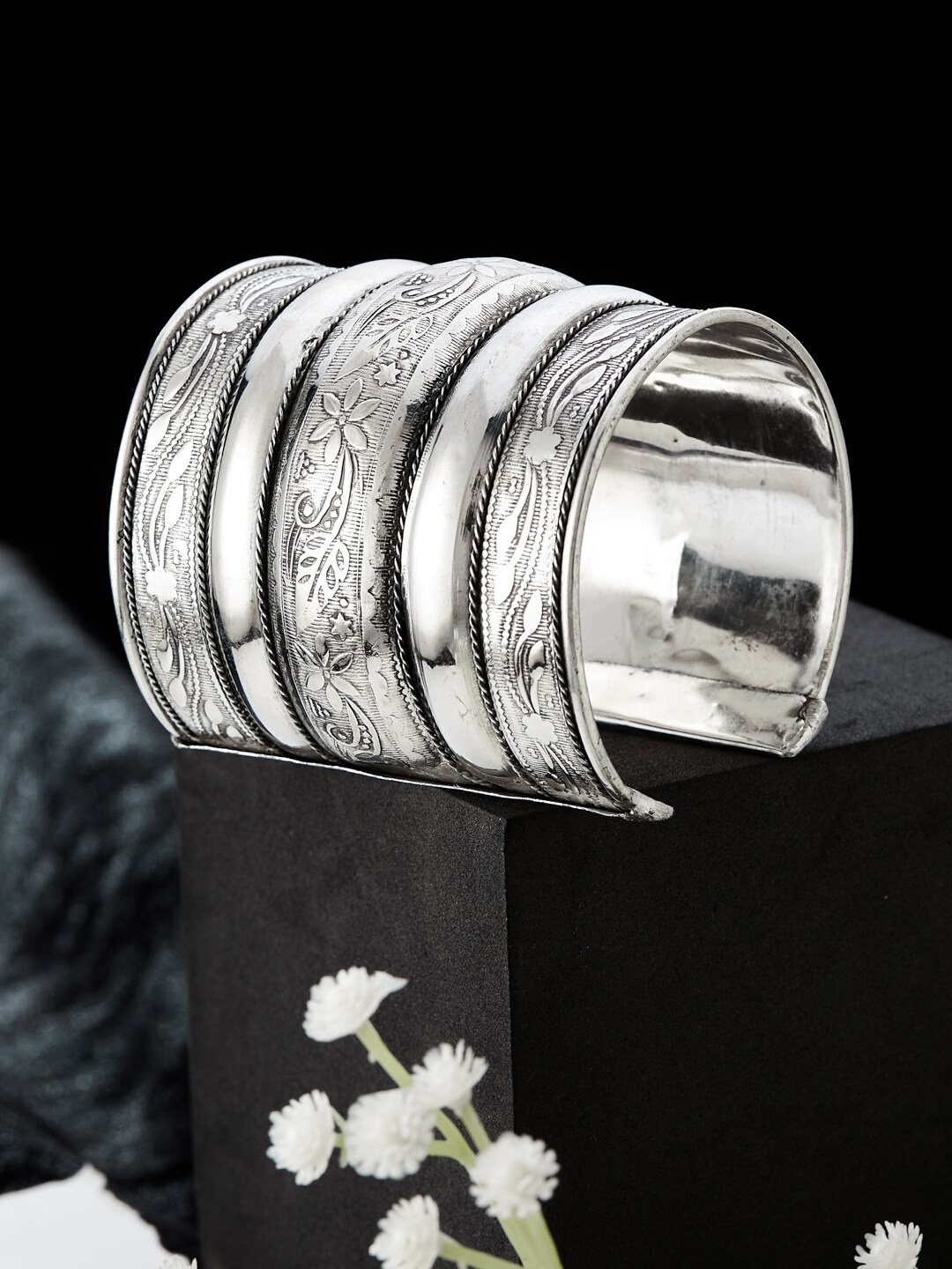 

ATIBELLE German Silver-Plated Floral Textured Round Shaped Bangle