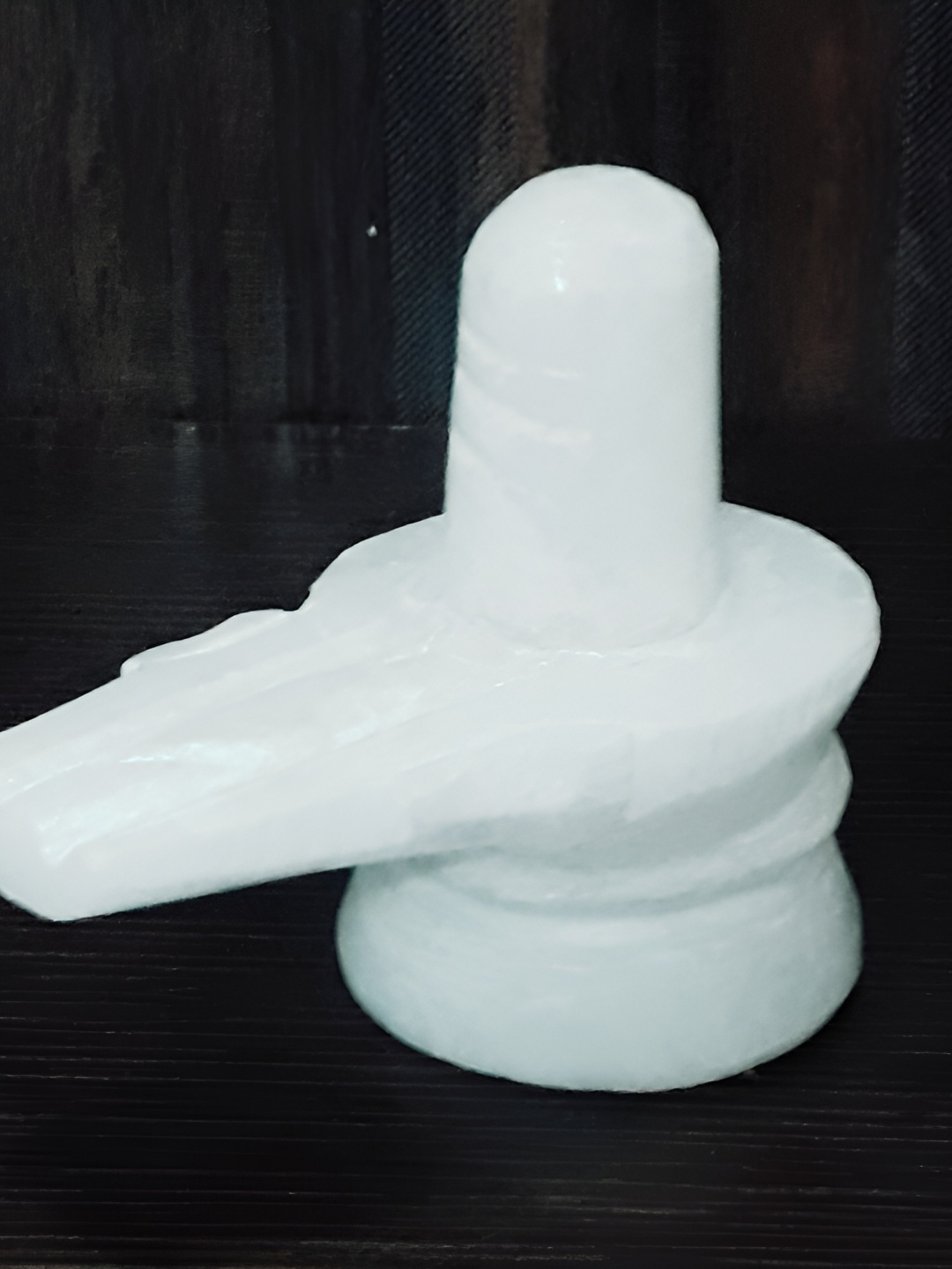 

Navyaksh White Religious Small Shivling Showpiece