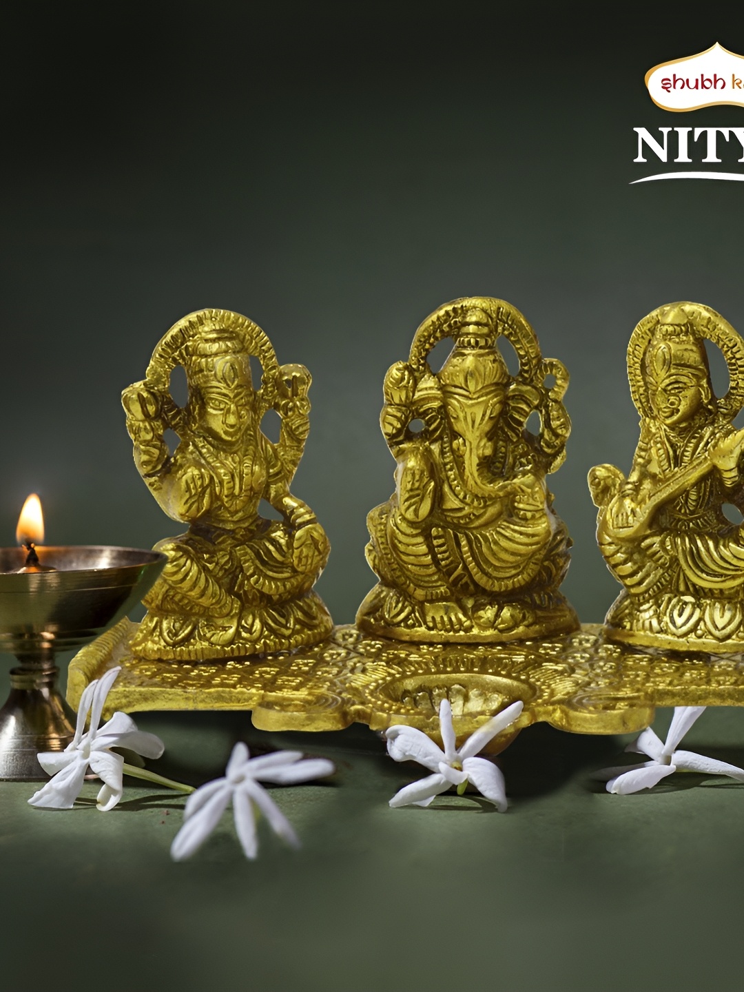 

Navyaksh Gold Toned Laxmi Ganesh Saraswati With Diya Religious Idol Showpiece