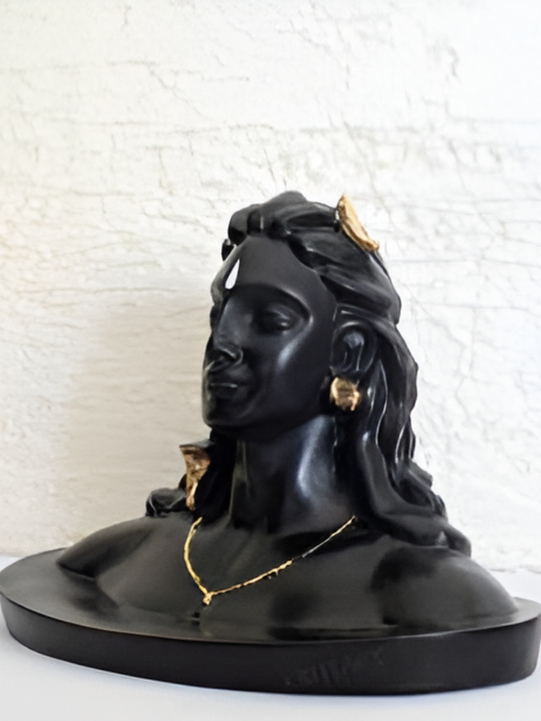 

Navyaksh Black & Gold Toned Religious Idol Showpiece