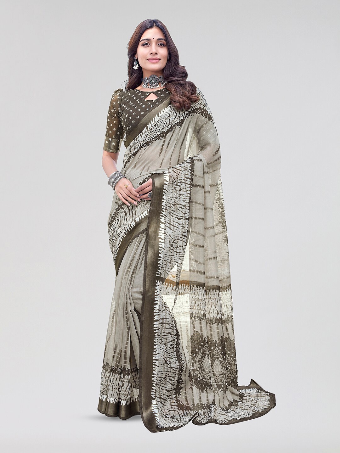 

Yashika Abstract Printed Zari Saree, Brown