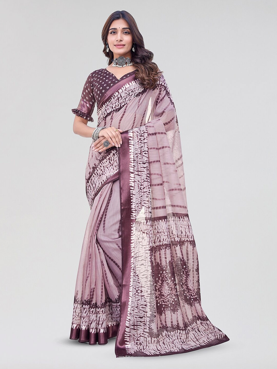 

Yashika Abstract Printed Leheriya Saree, Purple