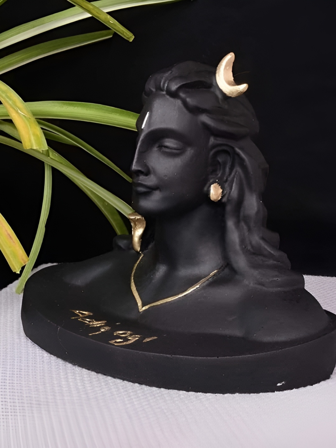 

Navyaksh Black & Gold Toned Adiyogi Shiva Religious Idol Showpiece