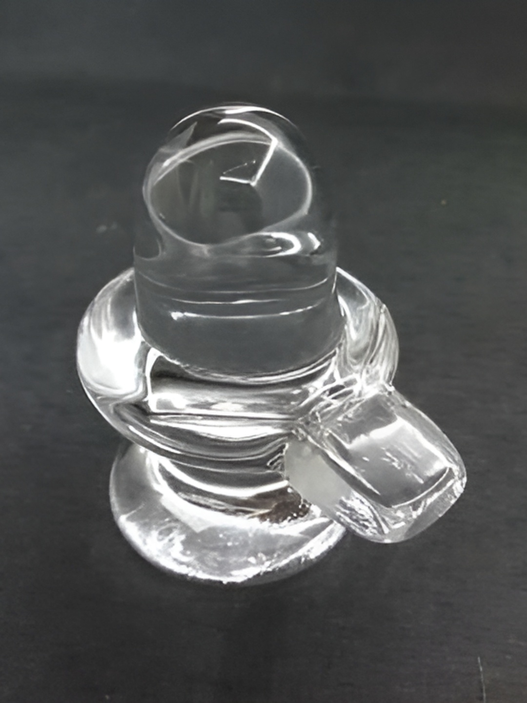 

Navyaksh Transparent Glass Shivling Decorative Showpiece