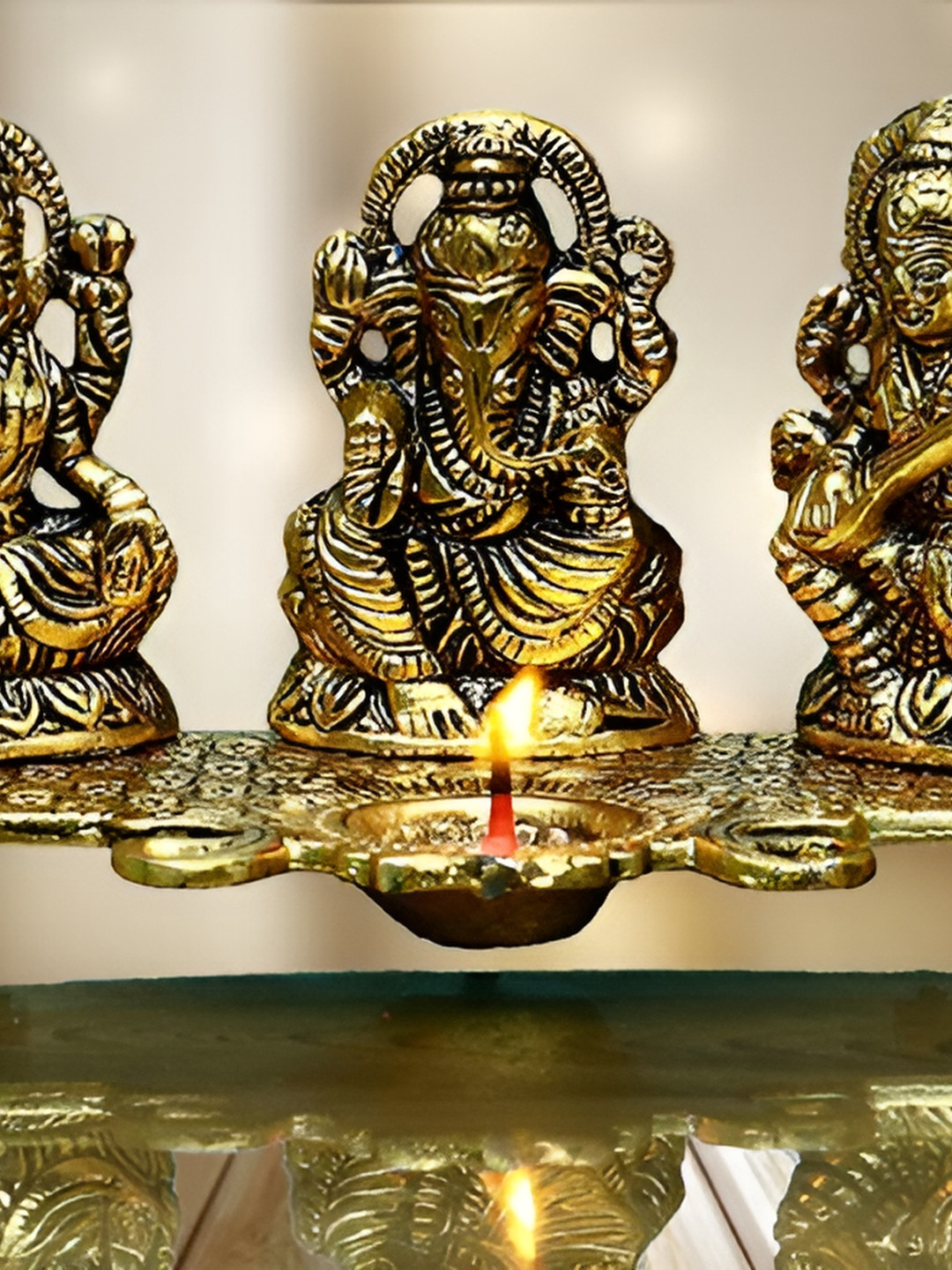 

Navyaksh Gold-Toned Religious Idol Showpiece