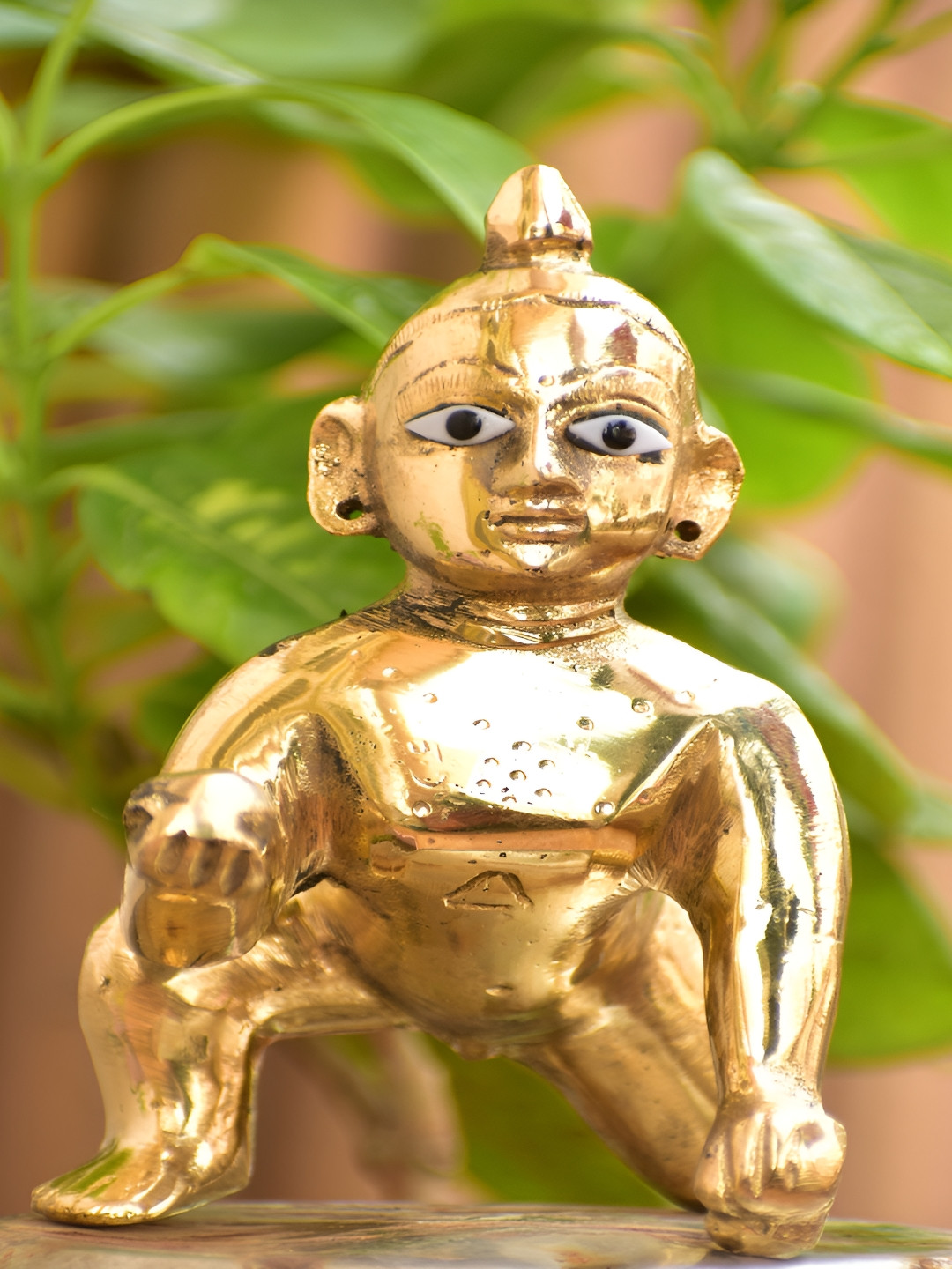

Navyaksh Gold-Toned Brass Religious Showpiece