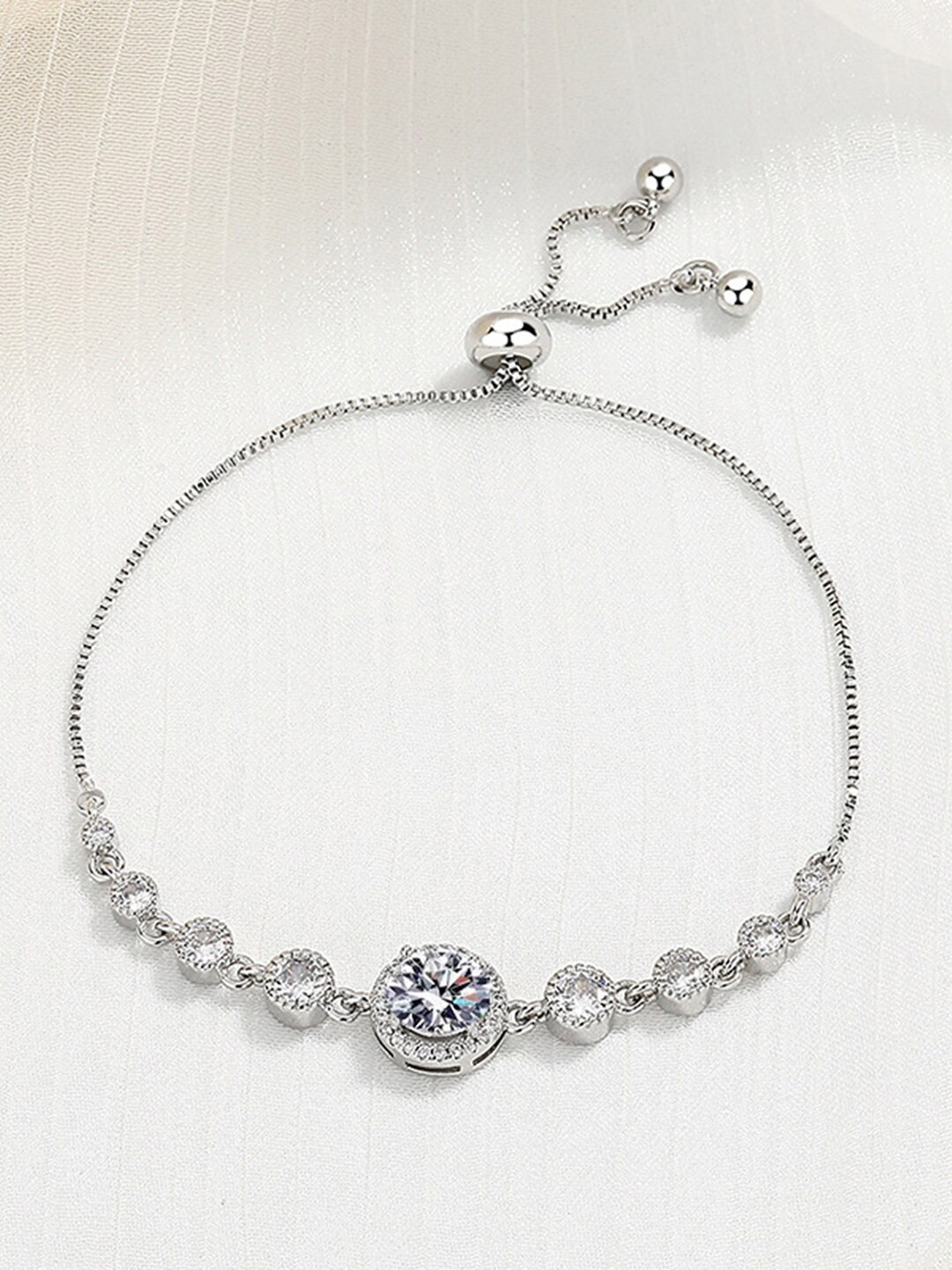 

Peora Silver-Plated Cubic Zirconia Charm Bracelet