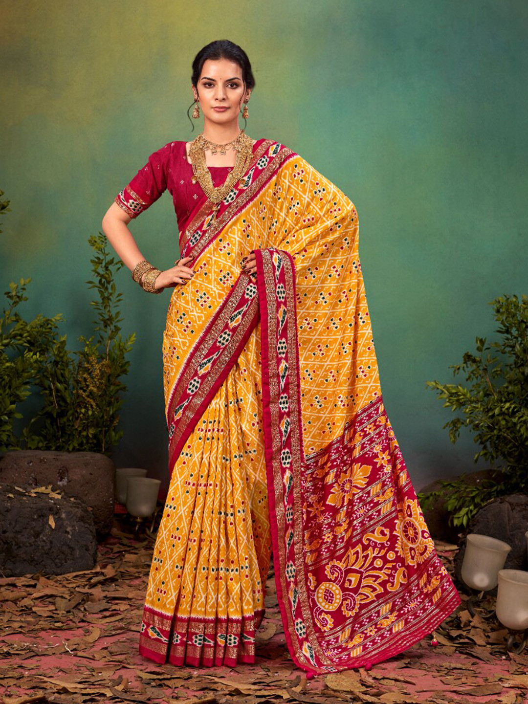

Mitera Gold Toned & Red Printed Zari Ikat Saree