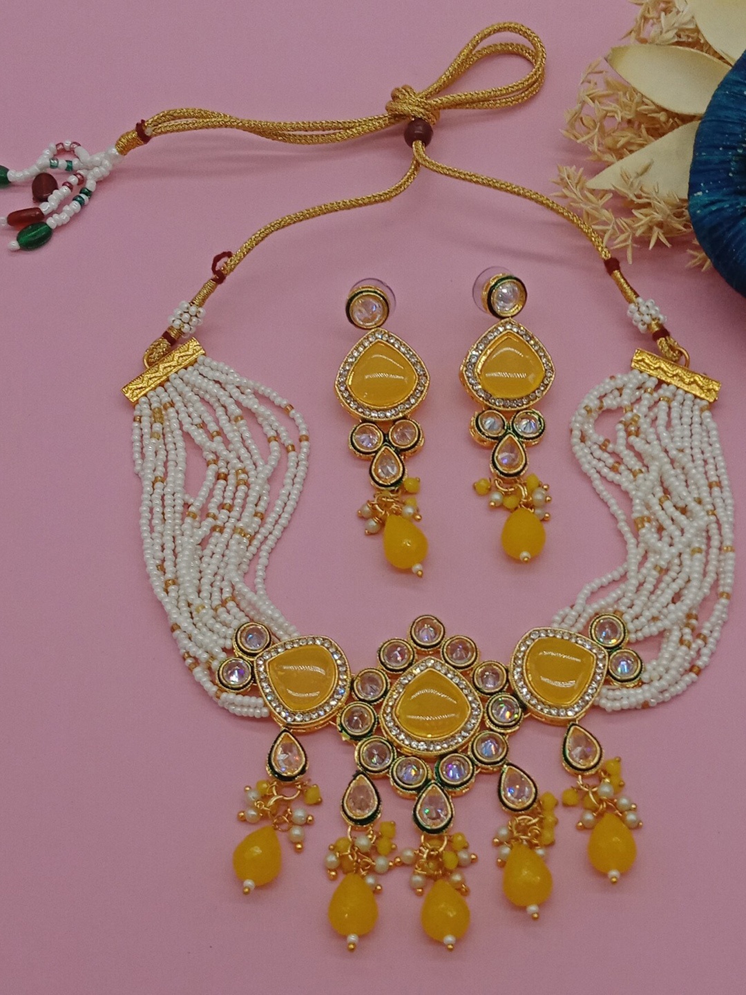 

AASHISH IMITATION Gold-Plated American Diamond Studded & Beaded Jewellery Set