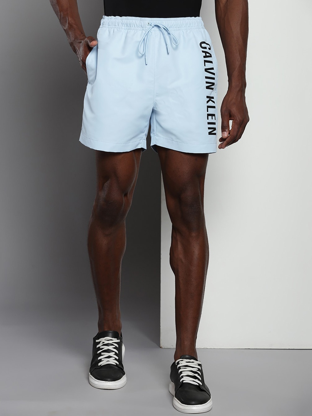 

Calvin Klein Men Typography Printed Shorts, Blue