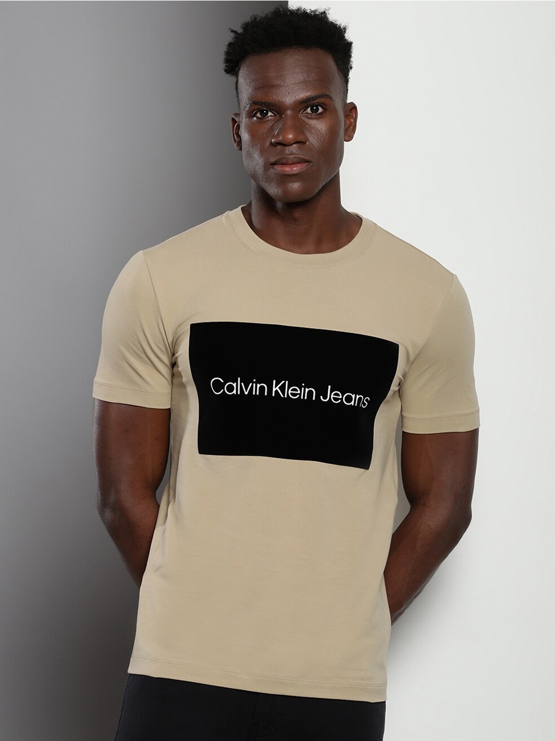 

Calvin Klein Jeans Typography Printed Slim Fit T-shirt, Beige