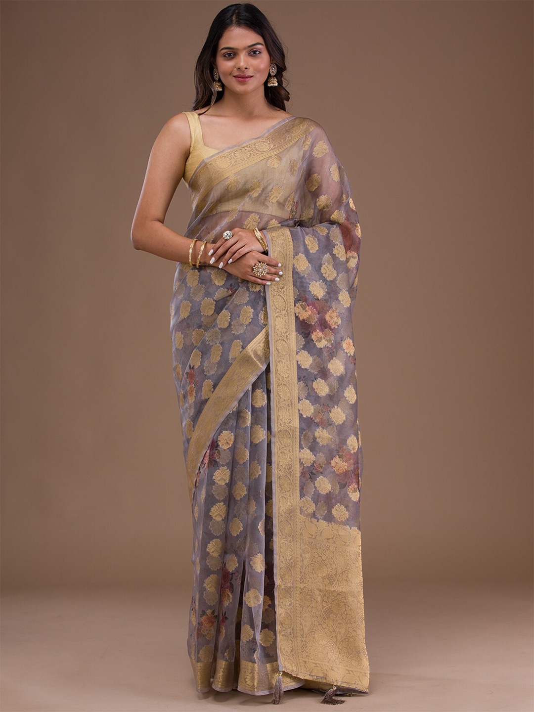 

Koskii Ethnic Motifs Woven Design Zari Tissue Saree, Brown