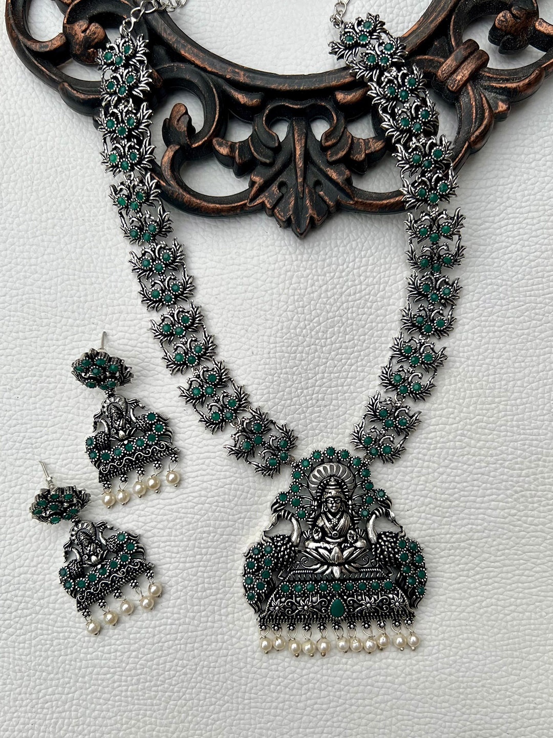 

Prettilicious Silver-Plated Stone Studded & Beaded Oxidised Temple Necklace and Earrings