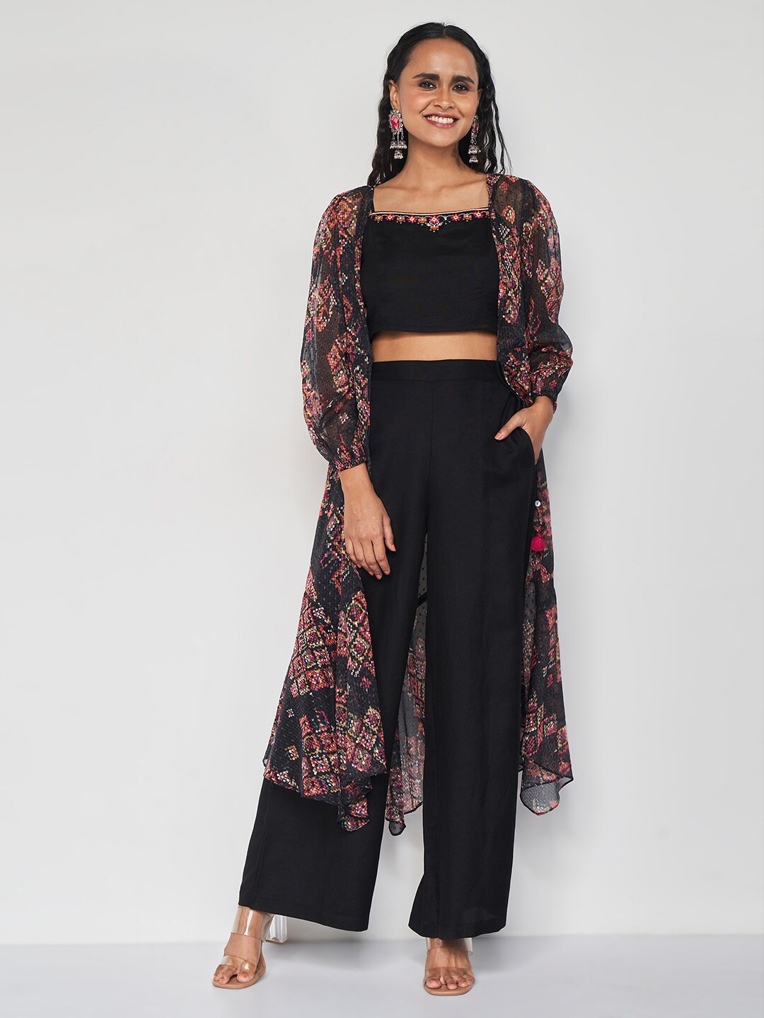 

Global Desi Shoulder Strap Neck Crop Top With Shrug & Trousers Co-Ords, Black