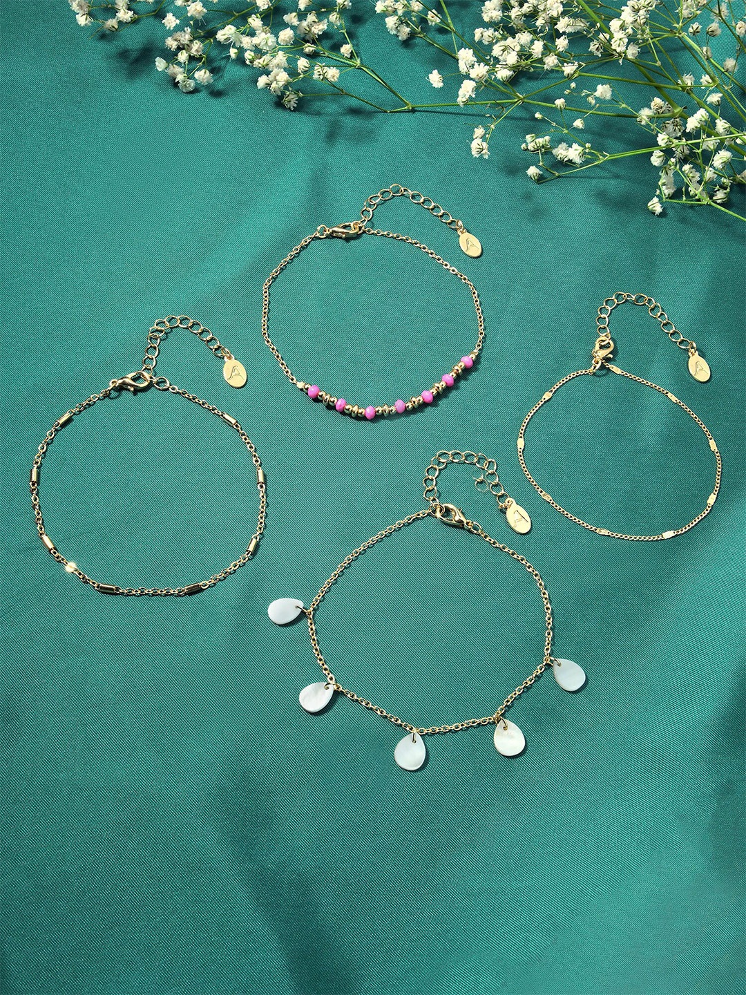 

Accessorize London Women Set Of 4 Teardrop Anklets, Gold
