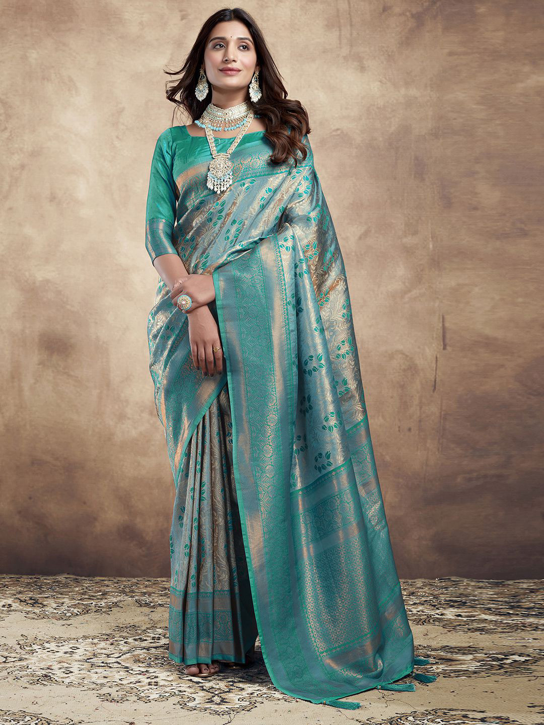 

Mitera Teal Blue & Gold Toned Floral Woven Design Zari Jacquard Banarasi Saree