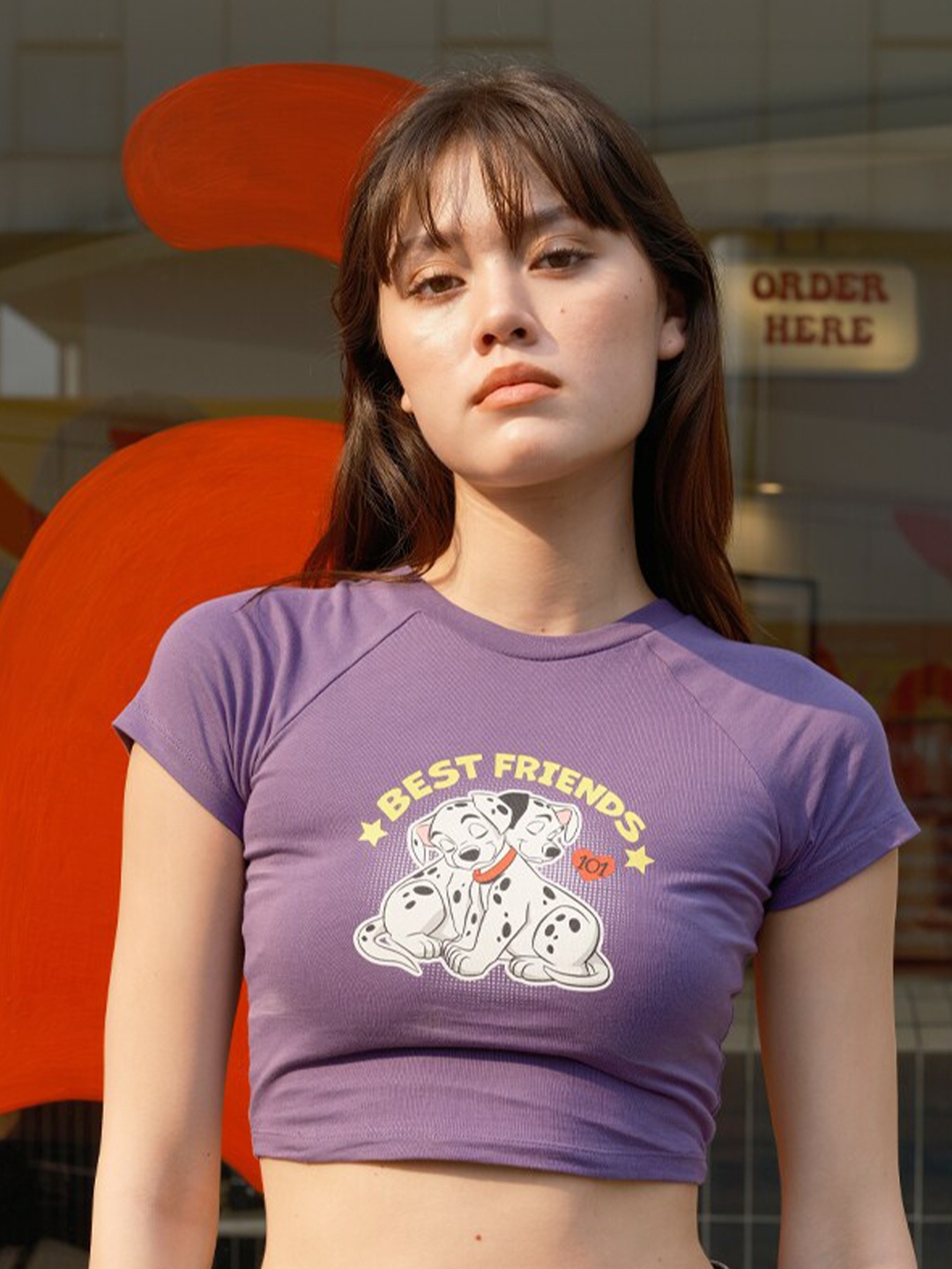 

Bonkers Corner Purple 101 Dalmatians Printed Round Neck Cotton Crop Top