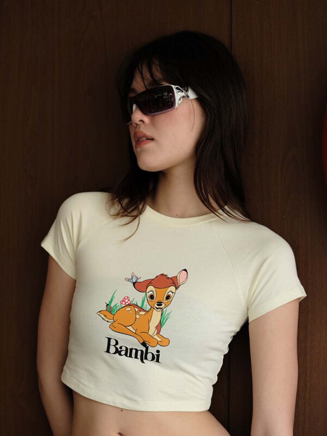 

Bonkers Corner Beige Graphic Printed Raglan Sleeves Cotton Crop Fitted Top