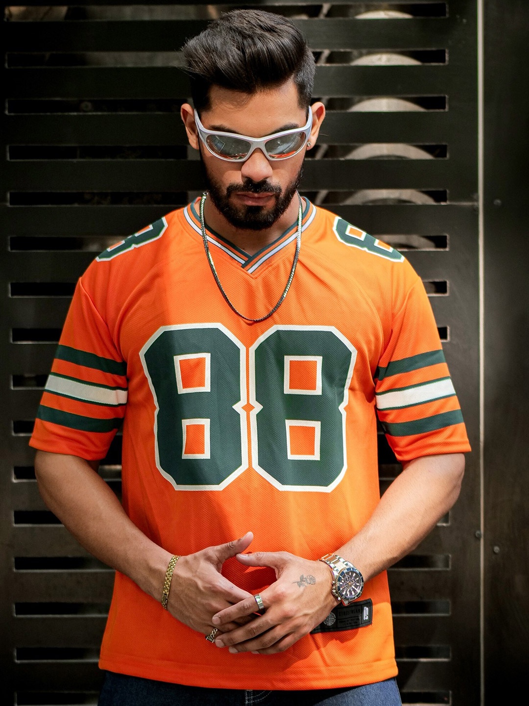 

Maniac Varsity Printed V-Neck Drop-Shoulder Sleeves Oversized T-shirt, Orange