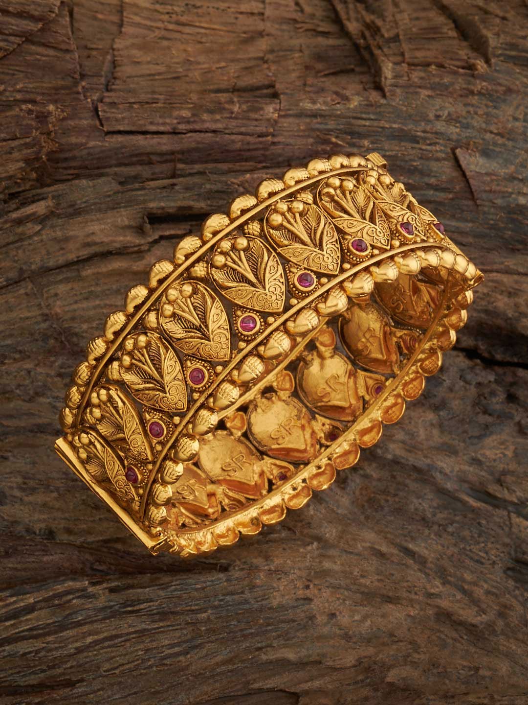 

Kushal's Fashion Jewellery Gold Plated Stones Studded Antique Bangle