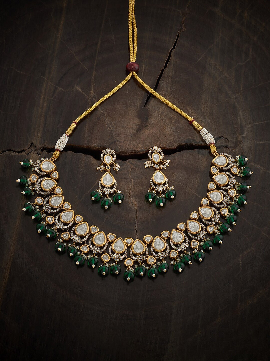 

Kushal's Fashion Jewellery Kundan Studded & Beaded Necklace & Earrings, Gold