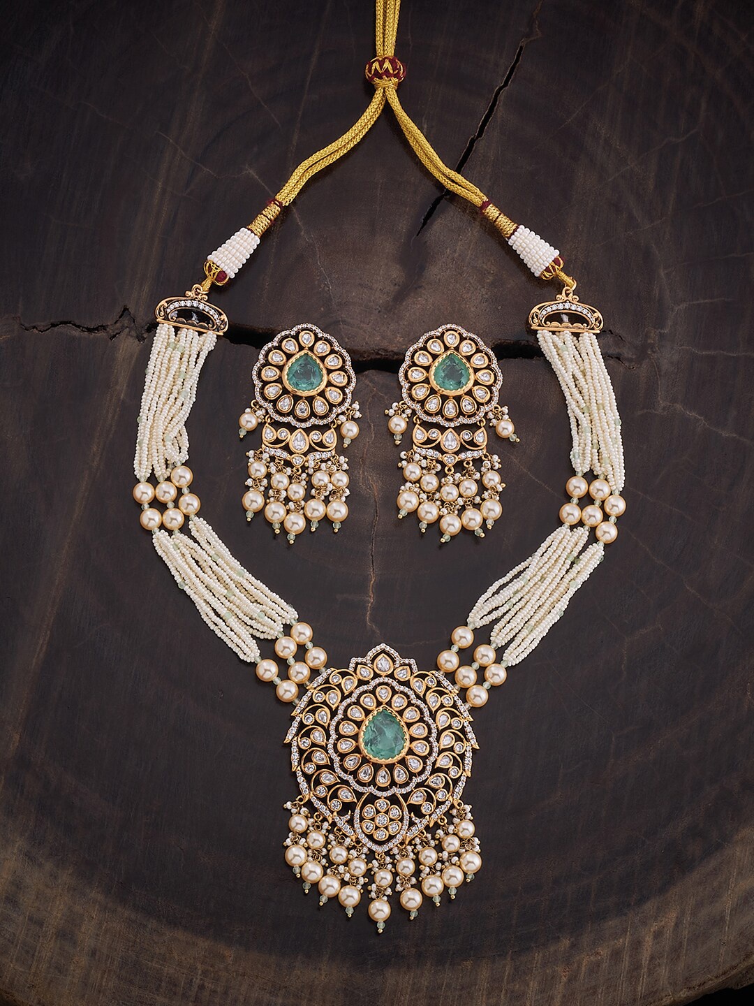 

Kushal's Fashion Jewellery Kundan Studded & Beaded Necklace & Earrings, Gold