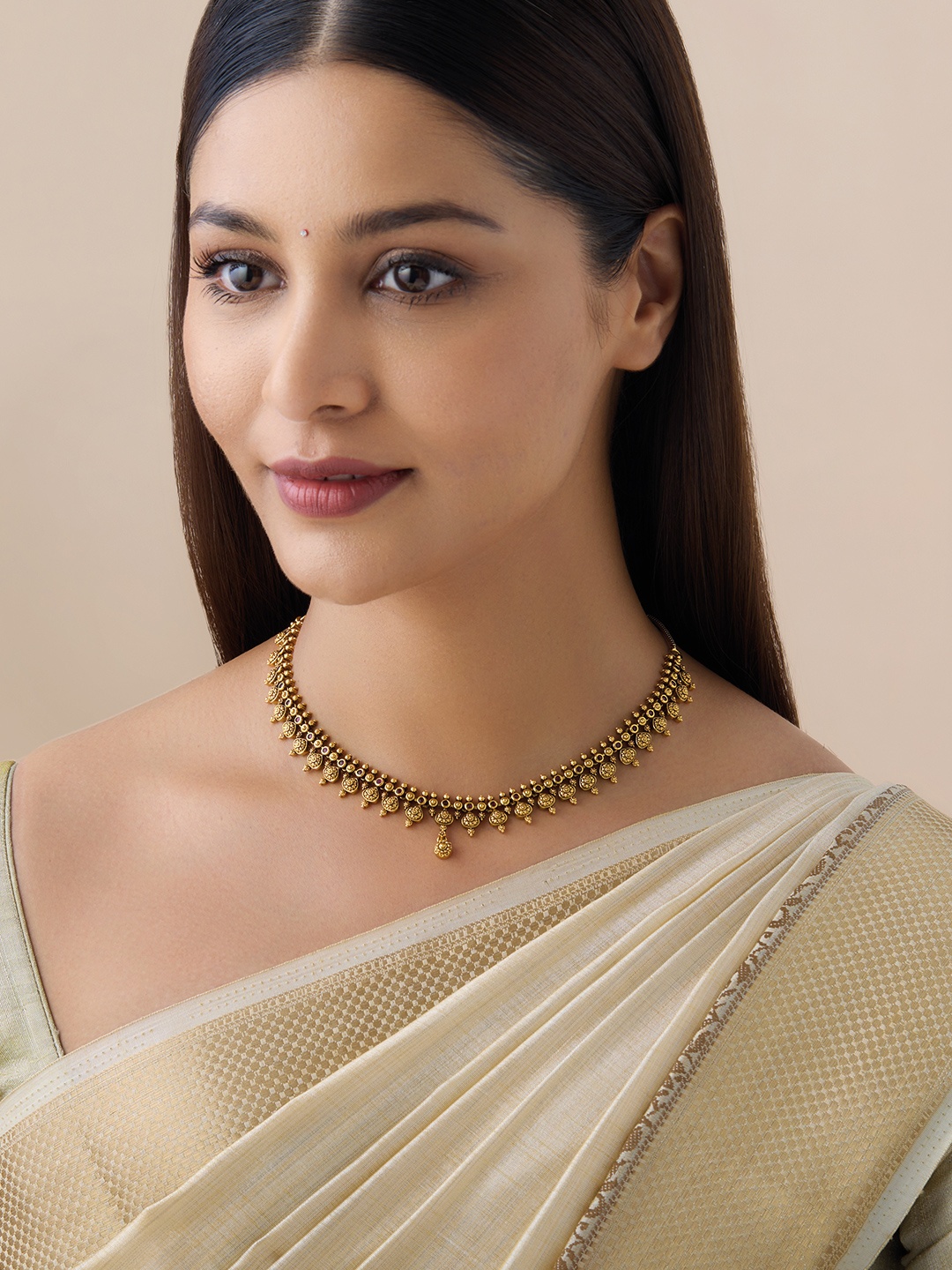

Kushal's Fashion Jewellery Gold-Plated Stones-Studded Antique Necklace