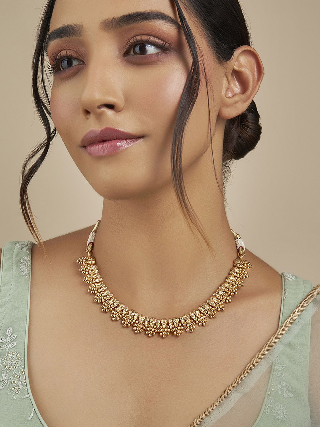 

Kushal's Fashion Jewellery Gold-Plated Antique Necklace