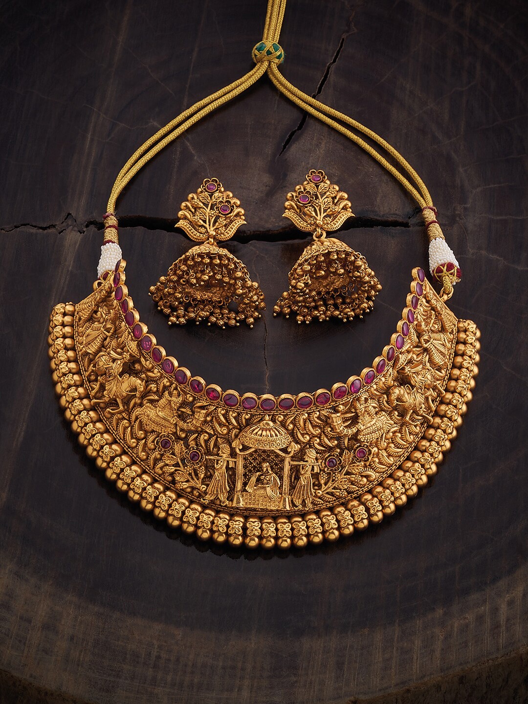 

Kushal's Fashion Jewellery Gold-Plated Stone Studded & Beaded Antique Jewellery Set