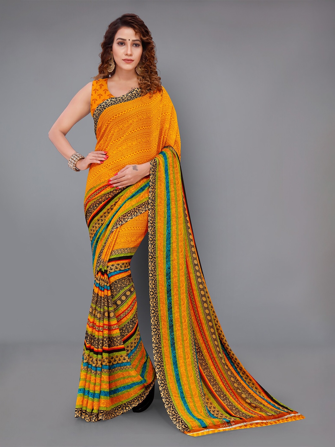 

Moda Rapido Striped Ethnic Motifs Printed Saree, Yellow
