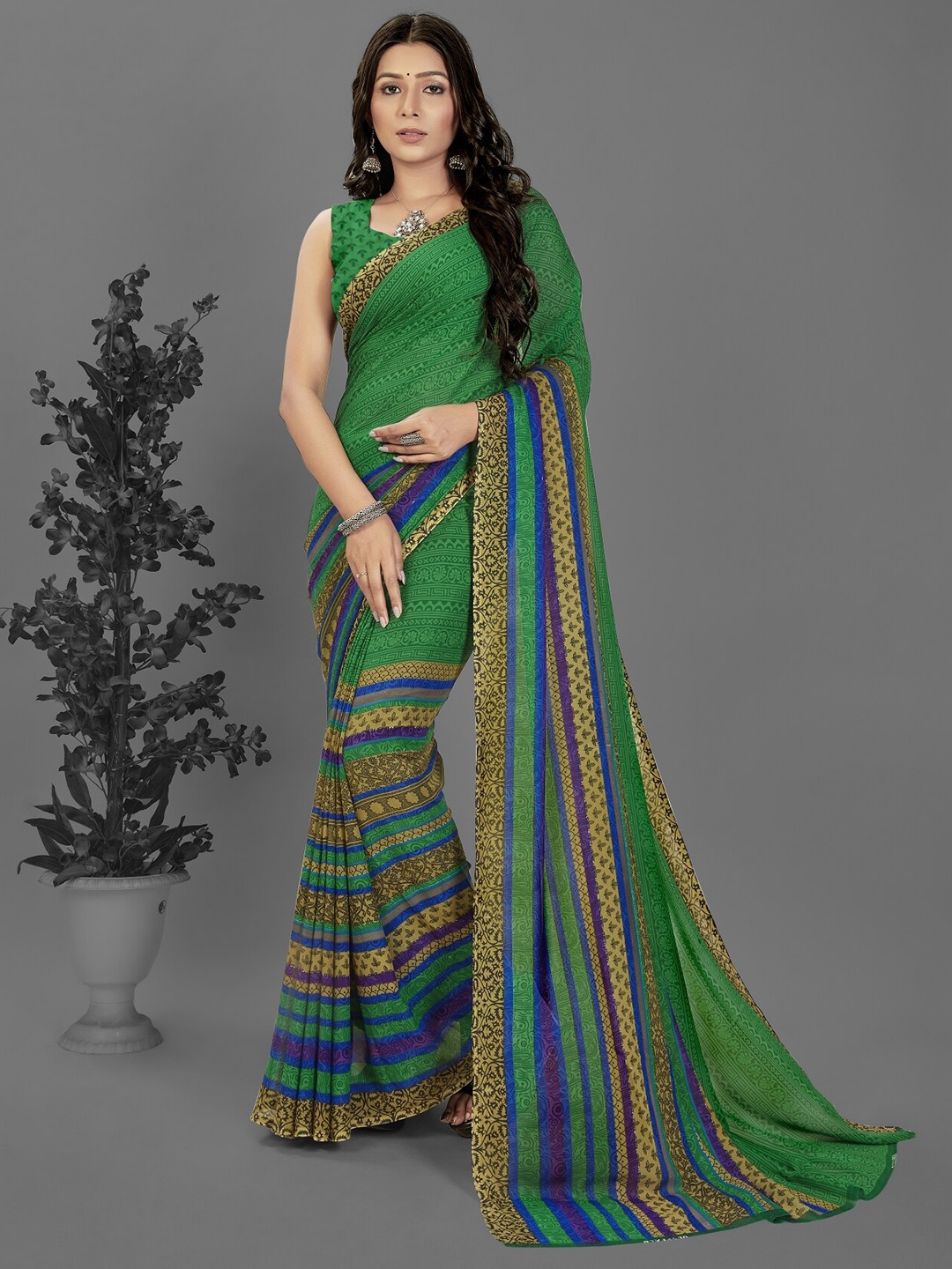 

Moda Rapido Ethnic Motifs Printed Poly Georgette Saree, Green