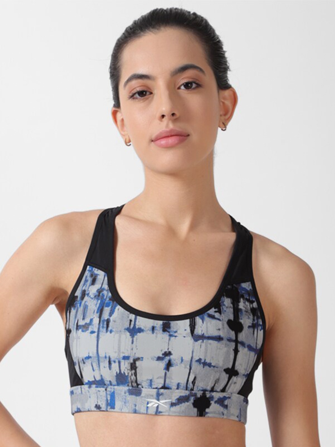 

Reebok Lux Perform Racer Aop Printed Workout Bra, Grey