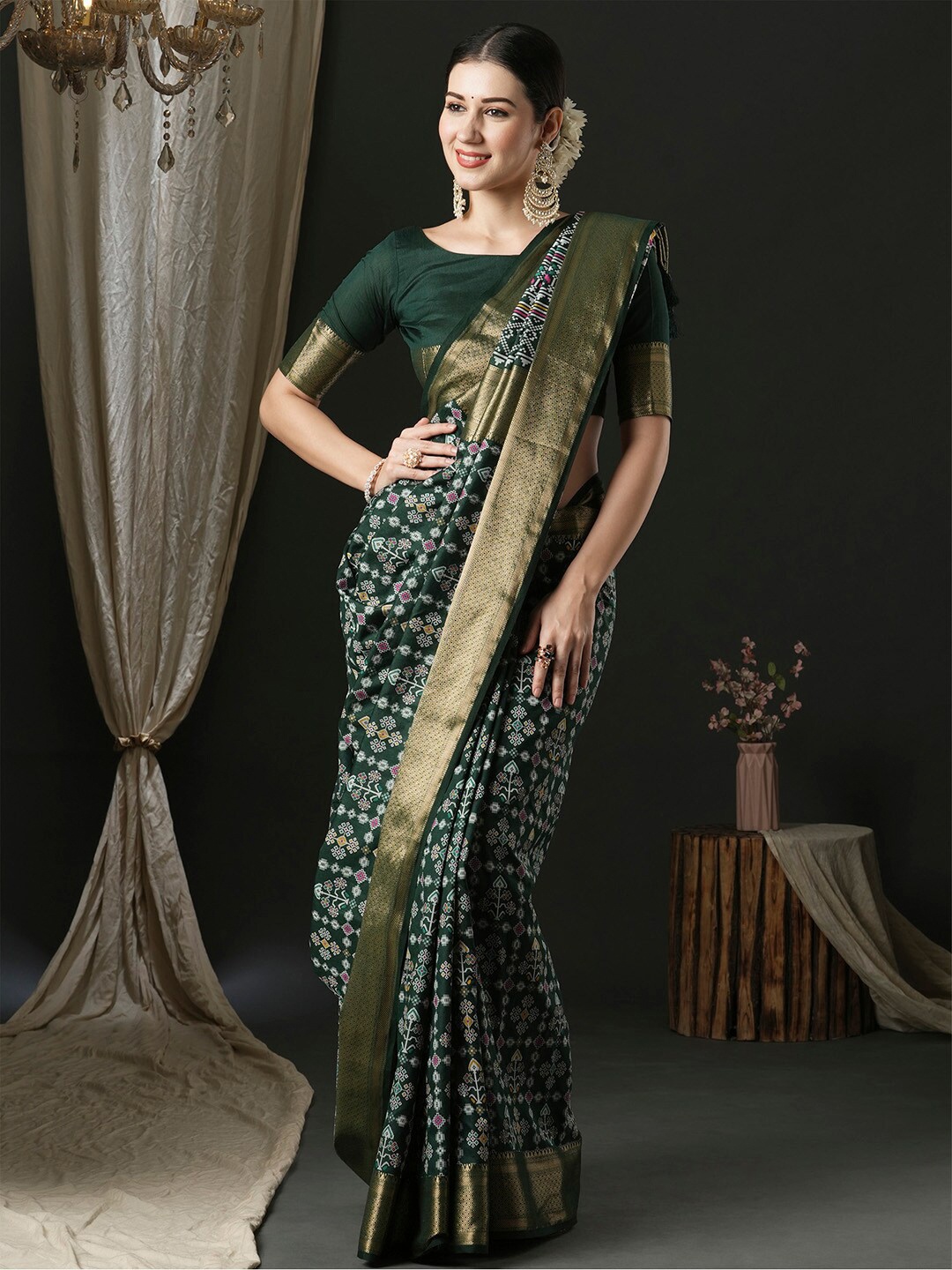 

Anouk Ethnic Motifs Woven Design Zari Patola Saree, Green