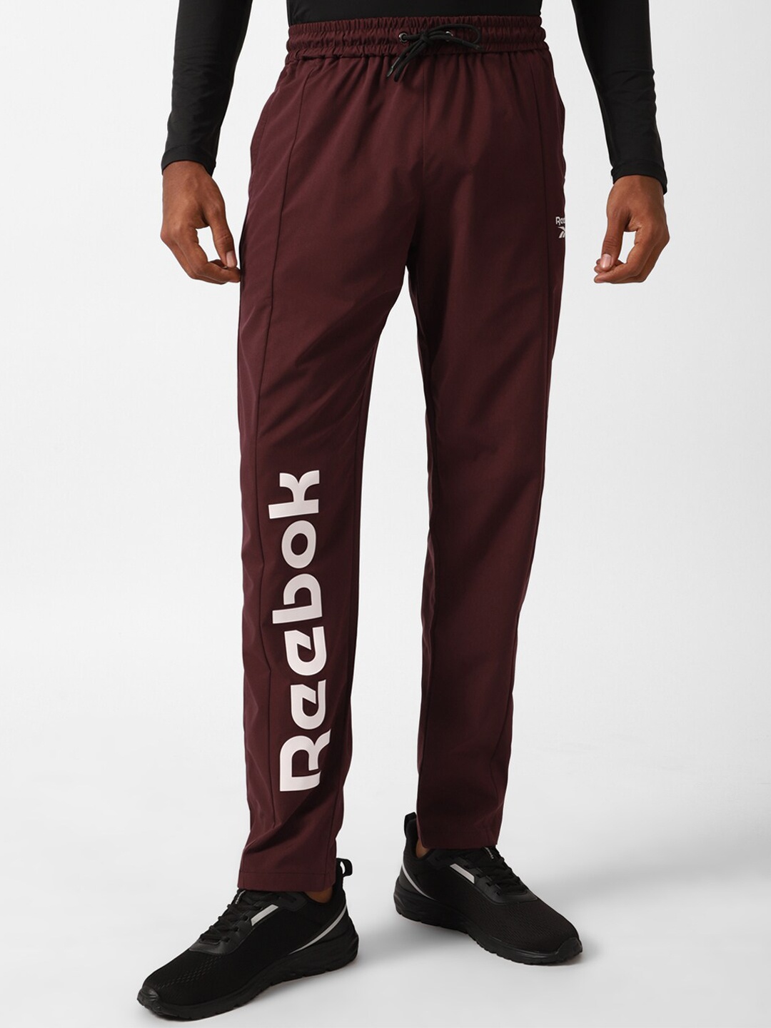 

Reebok Everyday Pt Men Logo-Printed Track Pants, Maroon