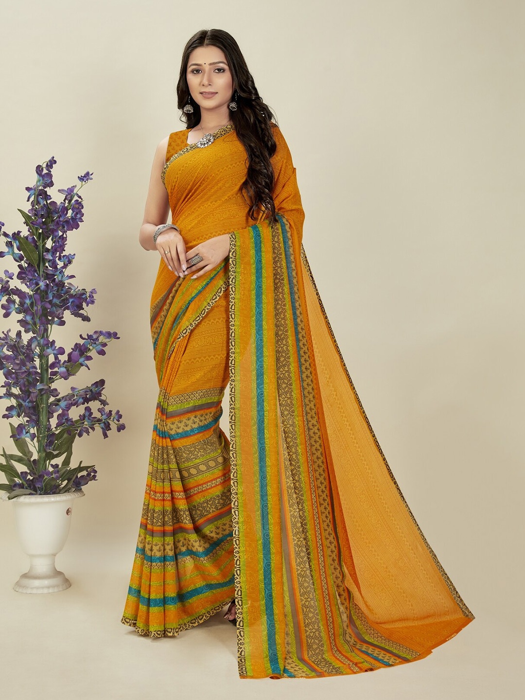 

Moda Rapido Ethnic Motif Saree With Blouse Piece, Mustard