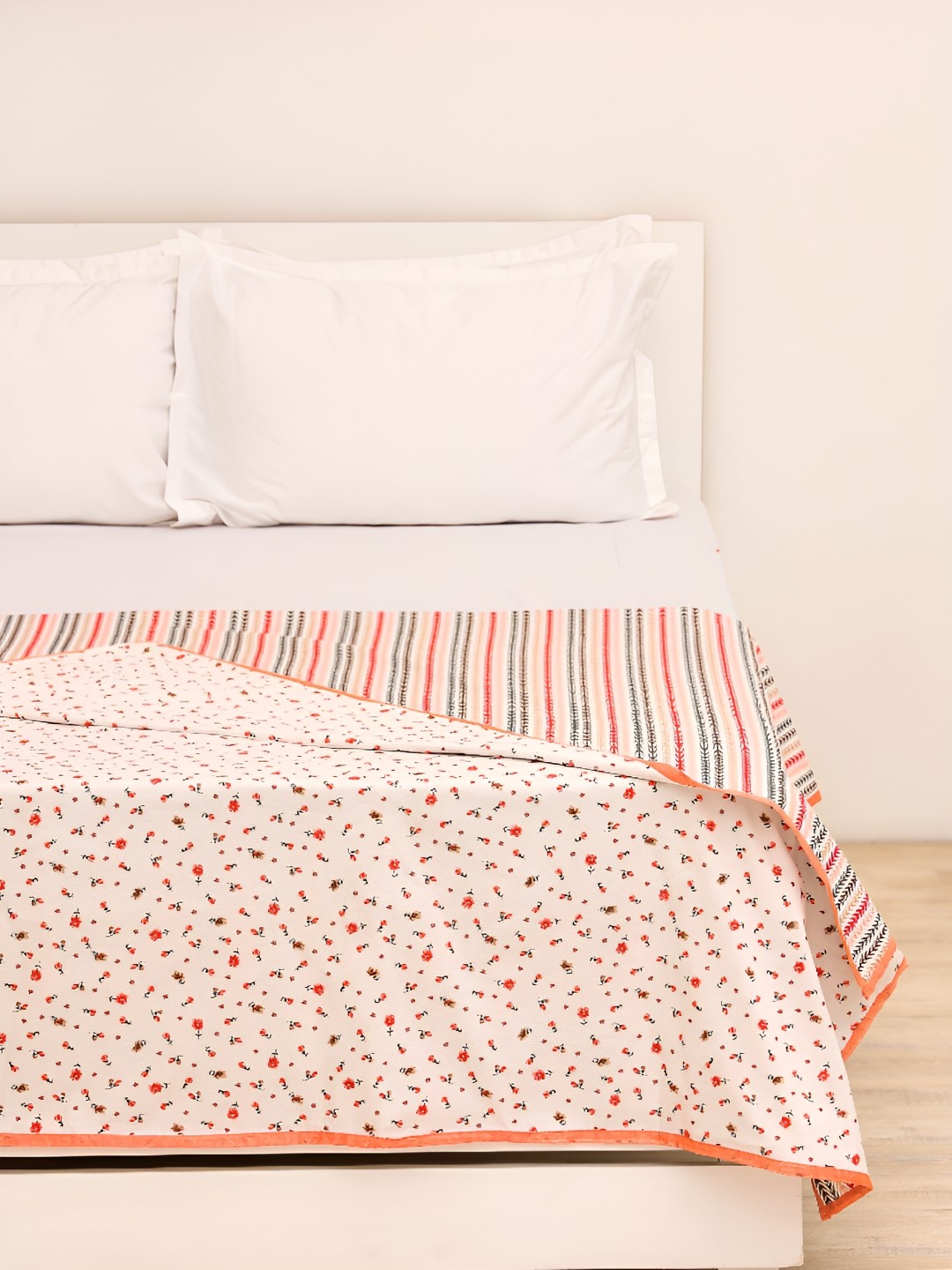 

Ariana Peach & Black Floral Cotton 120 GSM Double Bed Dohar