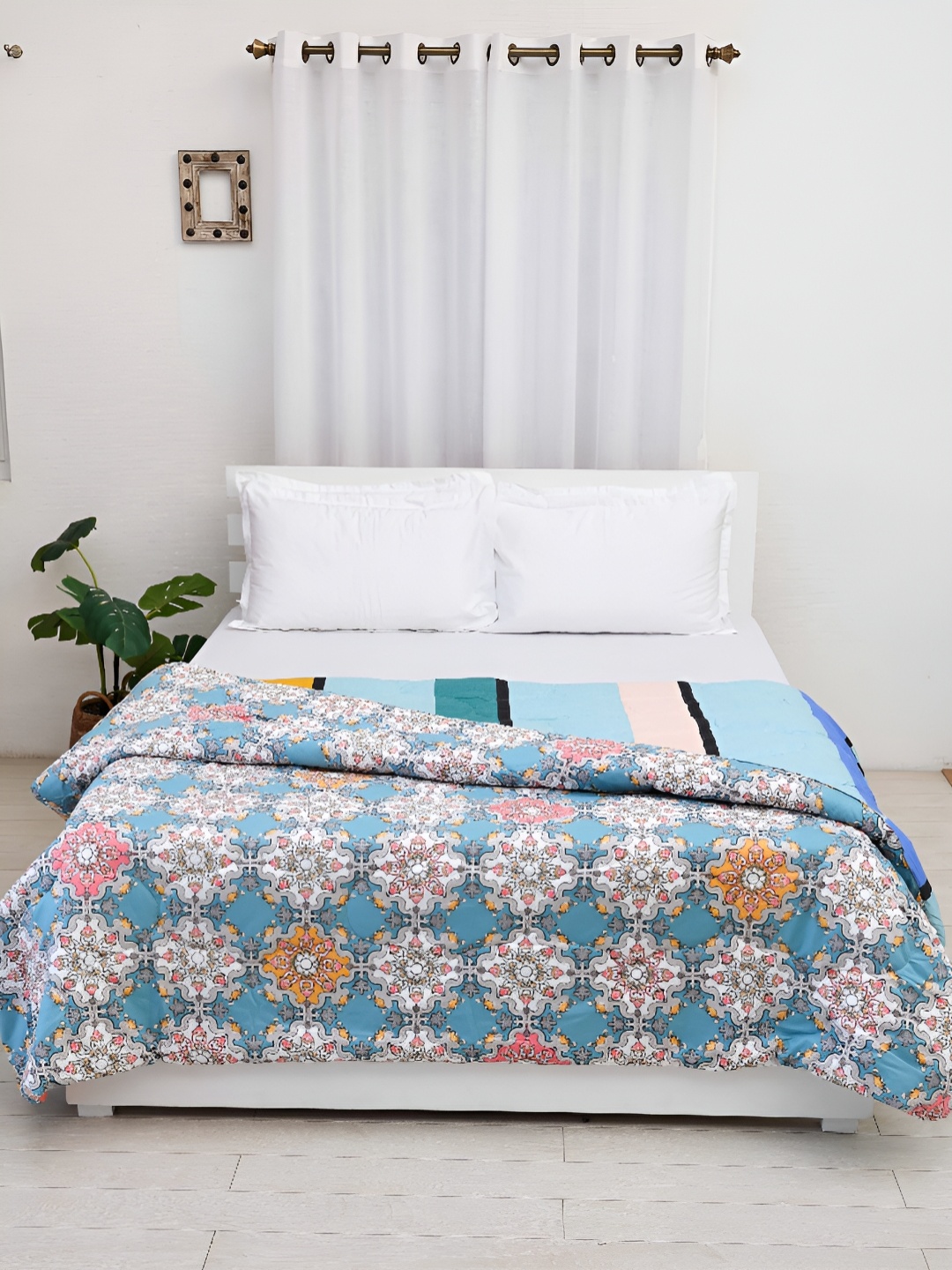 

Ariana Blue & Pink Ethnic Motifs Microfiber 150 GSM Double Bed Comforter