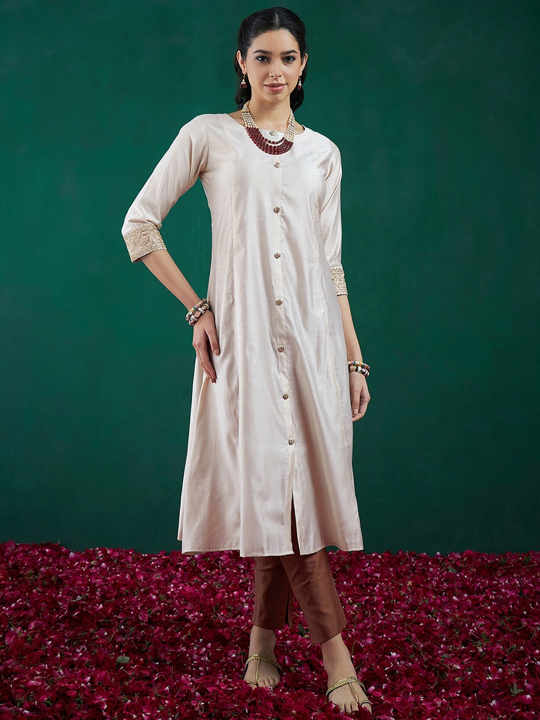 

Indo Era Off White Round Neck Embroidered A-Line Kurtas