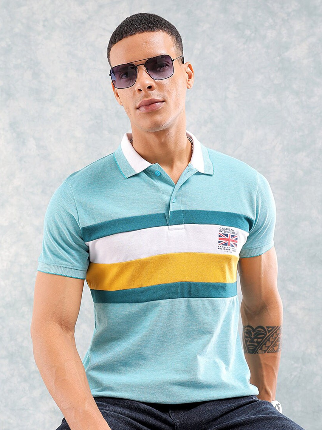 

The Indian Garage Co Striped Polo Collar Slim Fit T-shirt, Green