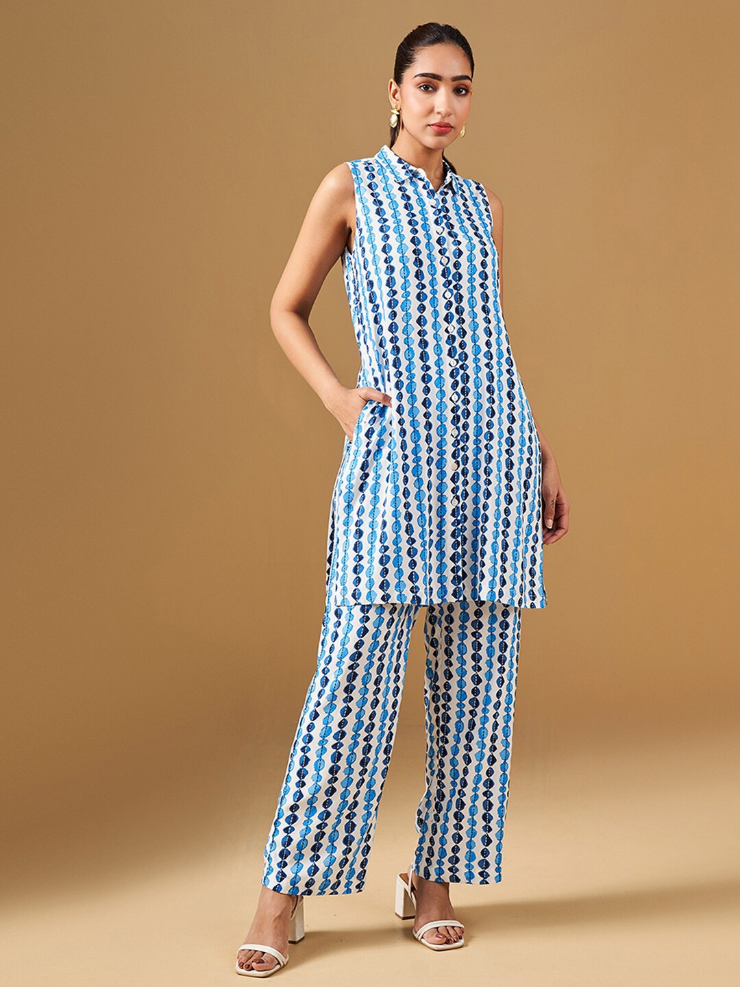 

Global Desi Geometric Printed Panelled Pure Cotton Kurta with Palazzos, Blue