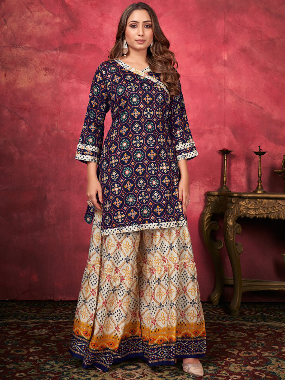 

Mitera Blue Bandhani Printed V-Neck Straight Kurta With Palazzos