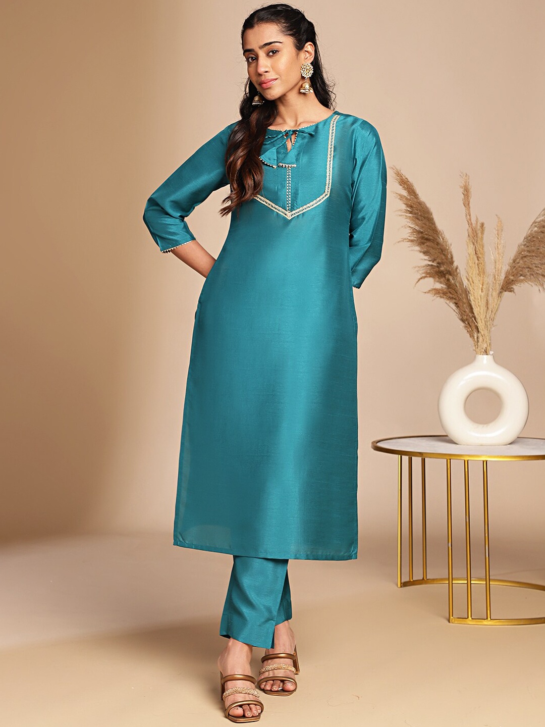 

KALINI Yoke Design Layered Tie-Up Neck Straight Kurta With Trouser, Teal