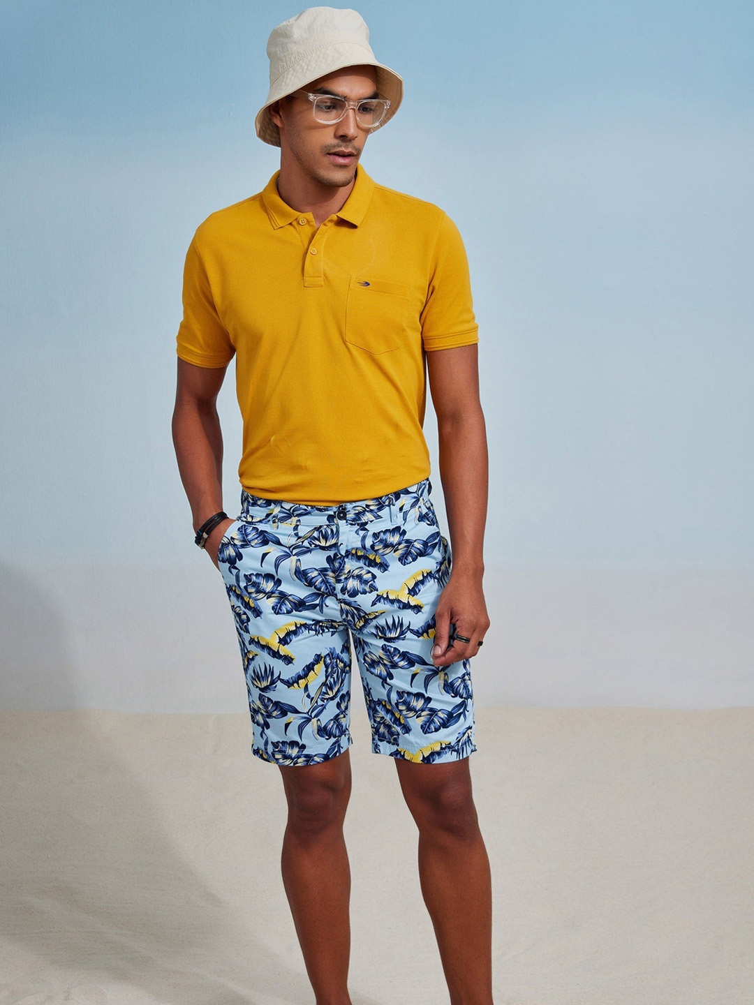 

Red Flame Men Floral Printed Above Knee Pure Cotton Shorts, Blue