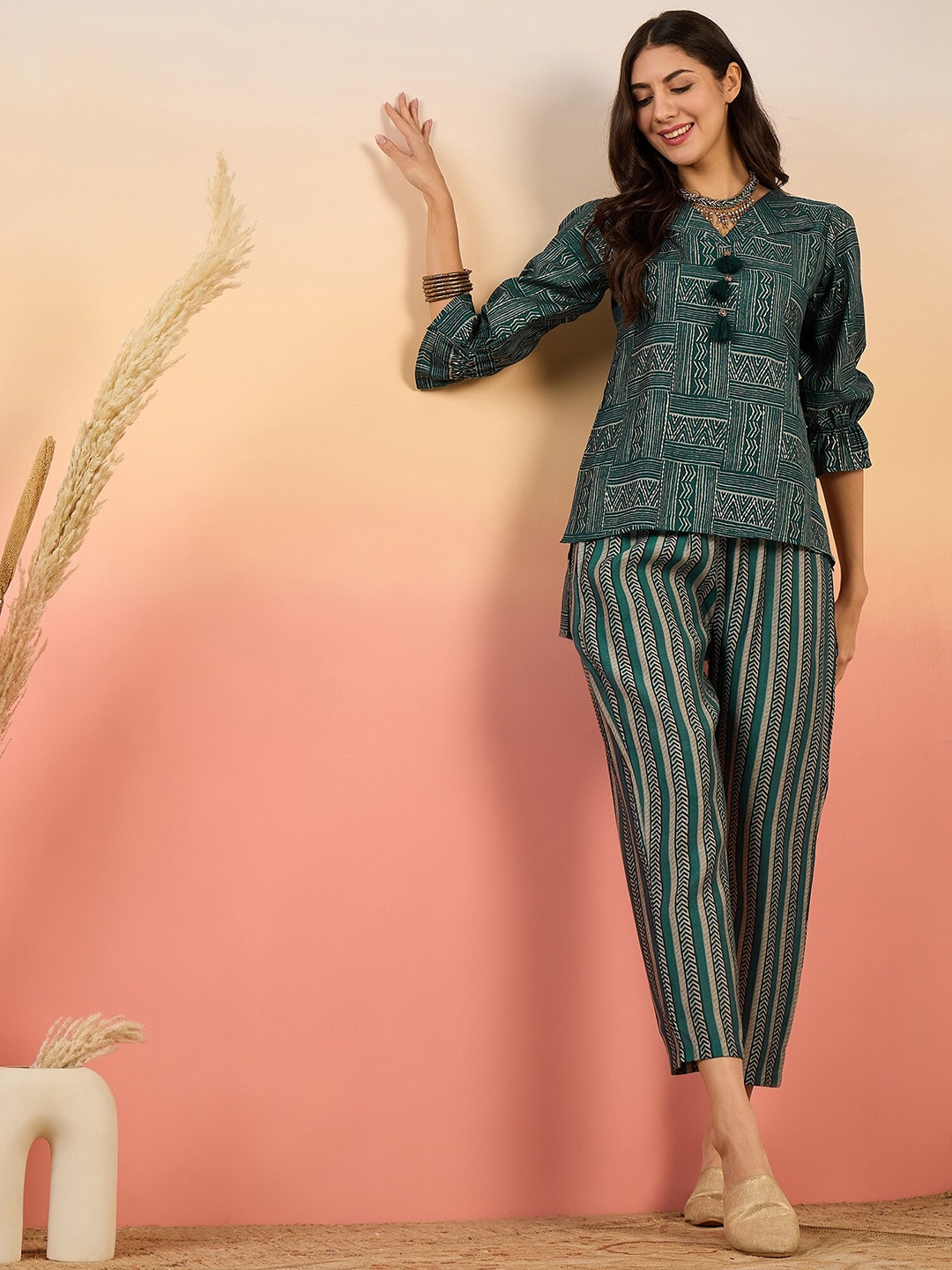 

Sangria Abstract Printed Top With Trousers Co-Ords, Green