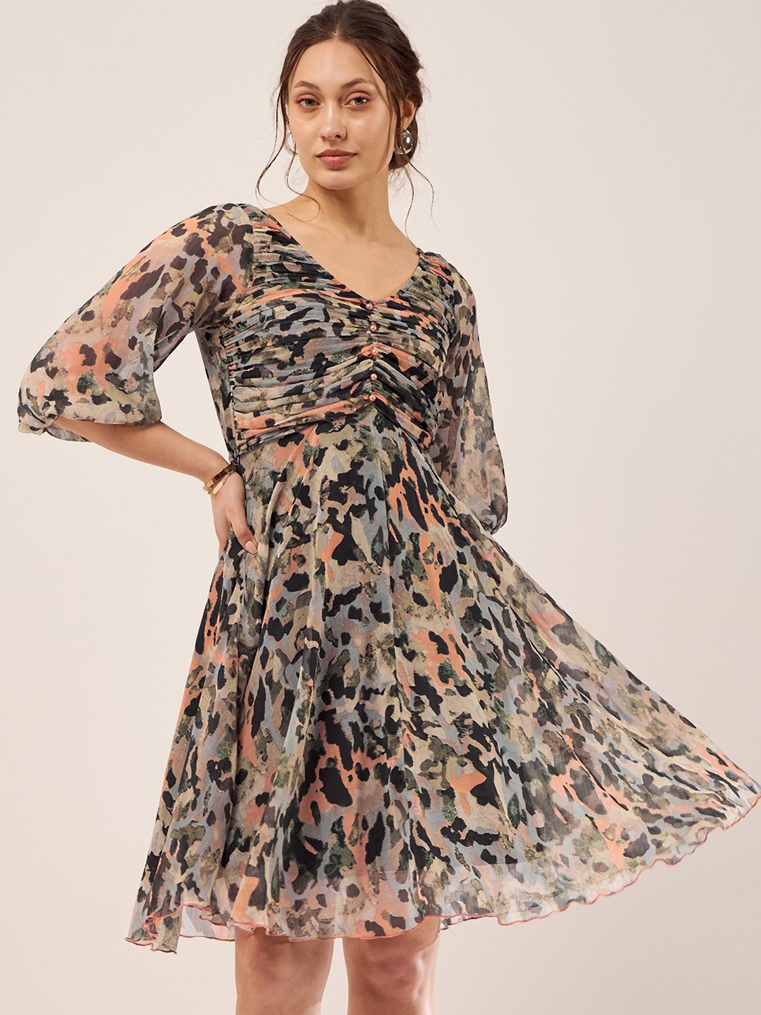 

Antheaa Black Abstract Printed Puff Sleeves Gathered Fit & Flare Dress