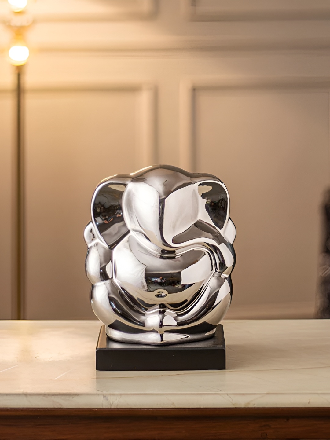 

THEDECORKART Silver-Toned Figurine Showpiece