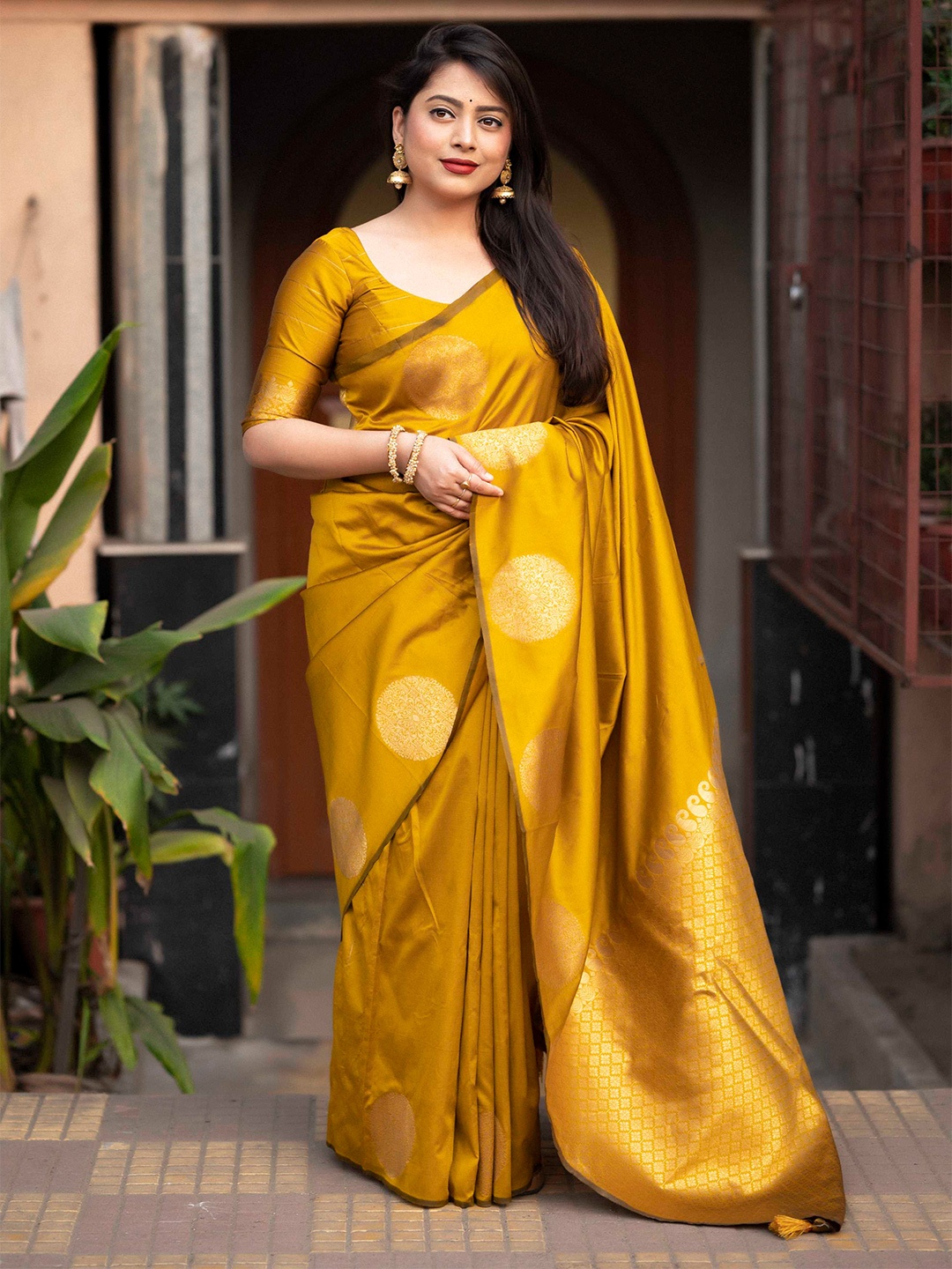 

Mitera Ethnic Motifs Woven Design Zari Banarasi Saree, Yellow