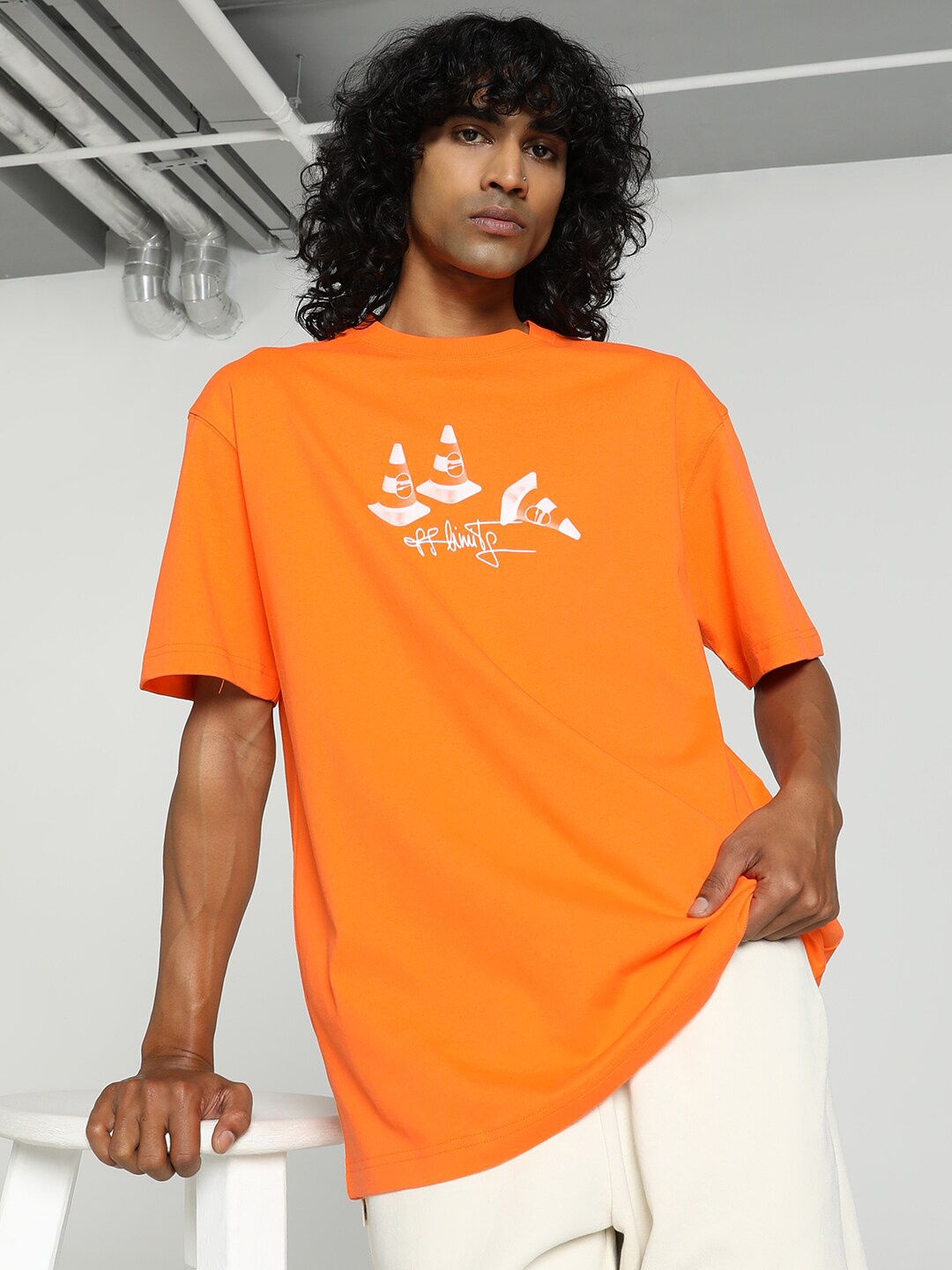 

Puma DOWNTOWN 180 Unisex Graphic Printed Cotton T-shirt, Orange